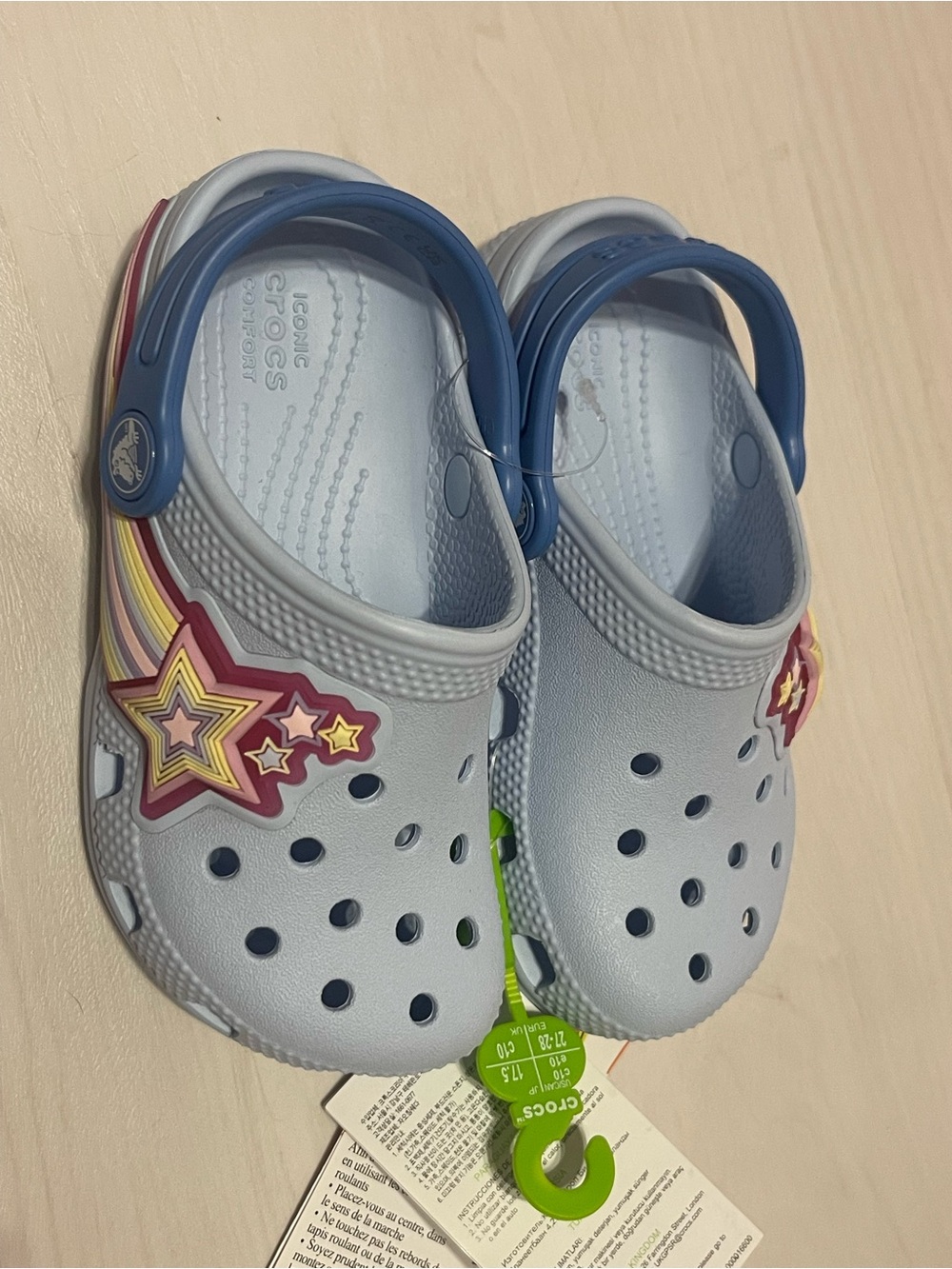 CROCS Kids Light Up Clogs with Blue Heel Straps and Multicolor Star Charms